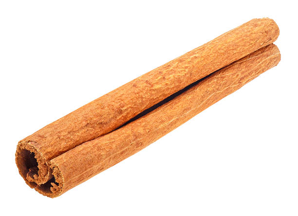 istock Single cinnamon stick isolated on a white background. Cinnamon bark. 1315323125