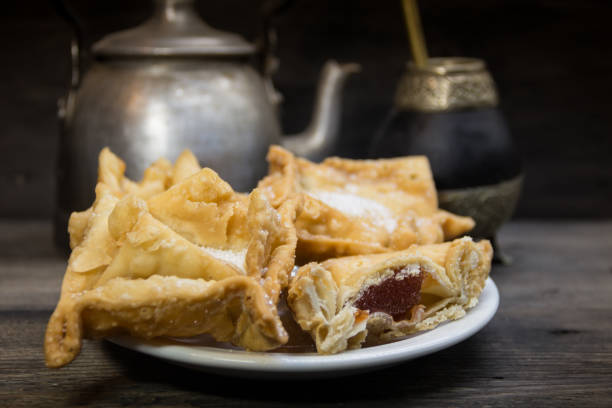 fried quince and sweet potato pastries with mate