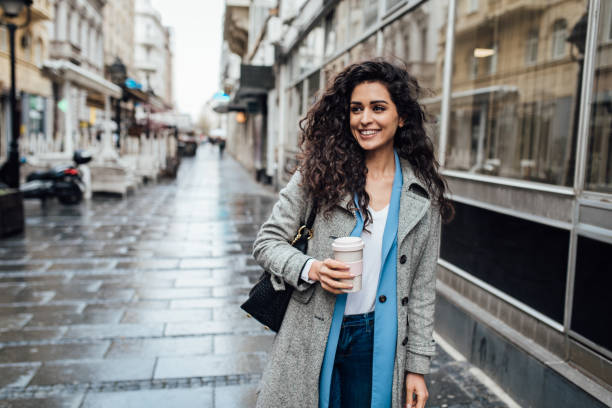 istock Beautiful woman enjoying coffee after work 1315333743