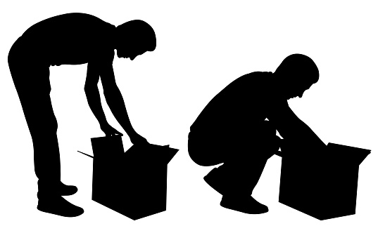 silhouettes of men opening boxes
