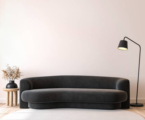 istock Modern living room mockup, black minimal sofa on empty wall background 1315337918