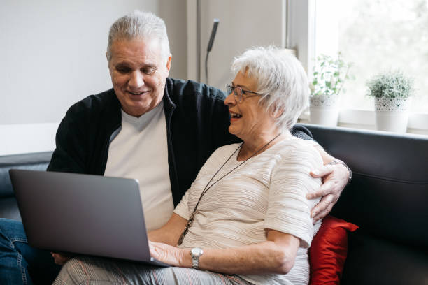 istock Elderly couple communicating via laptop 1315337968