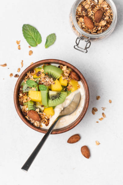 istock Mango yogurt with granola and kiwi 1315337975