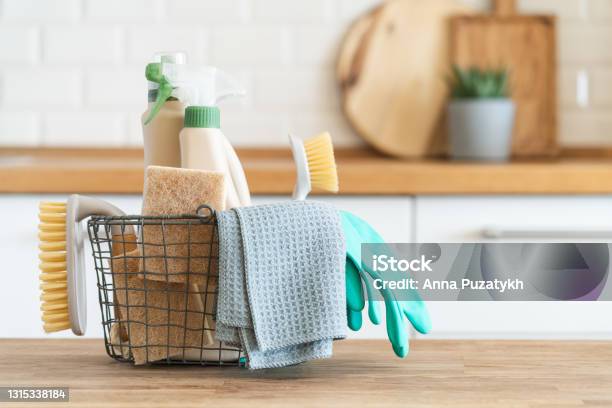 Basket With Brushes Rags Natural Sponges And Cleaning Products Stock Photo - Download Image Now