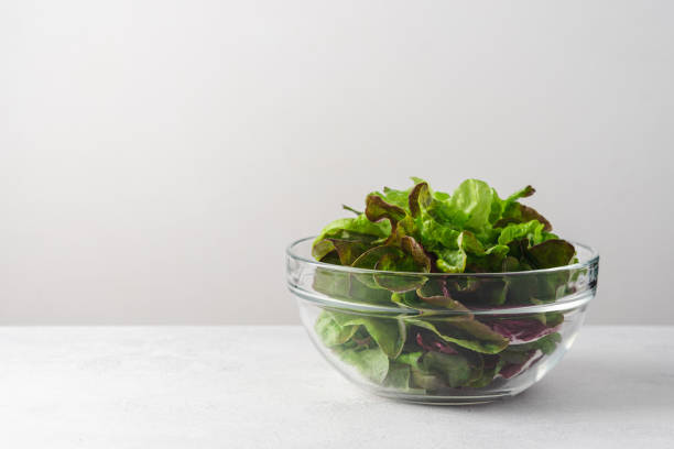 Green salad in glass bowl