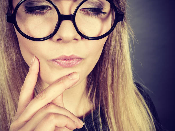 istock Closeup of woman thinking face expression 1315339295