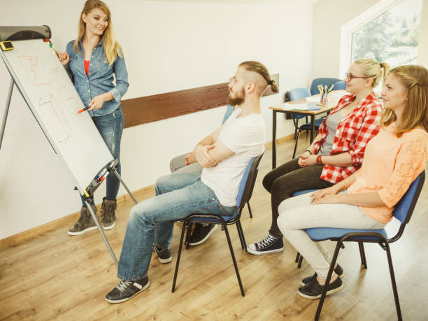 istock Teacher teaching mathematics to college students 1315340383