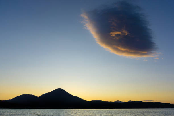 Broadford Bay on the Isle of Skye during sunset Illuminated cloud during sunset at the Atlantic Ocean. Broadford is a village in the south of the island isle of skye broadford stock pictures, royalty-free photos & images
