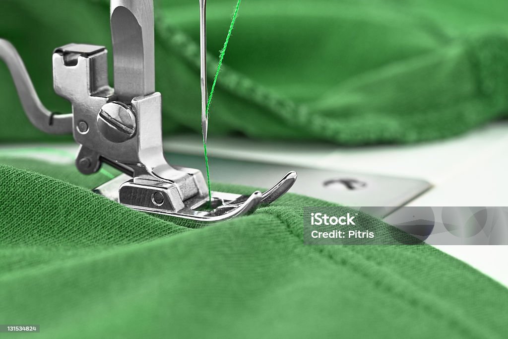 Sewing machine and item of clothing sewing machine, detail Green Color Stock Photo