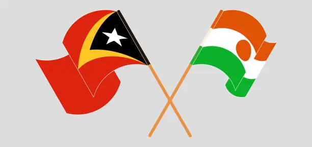 Vector illustration of Crossed and waving flags of East Timor and Niger