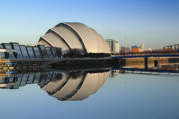 armadillo reflection Glasgow's Armadillo in winter sunshine reflected off River Clyde glasgow scotland stock pictures, royalty-free photos & images