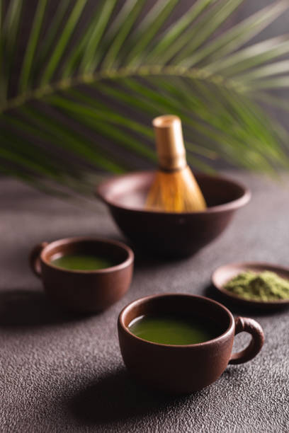 istock Matcha green tea in a ceramic mugs 1315354210