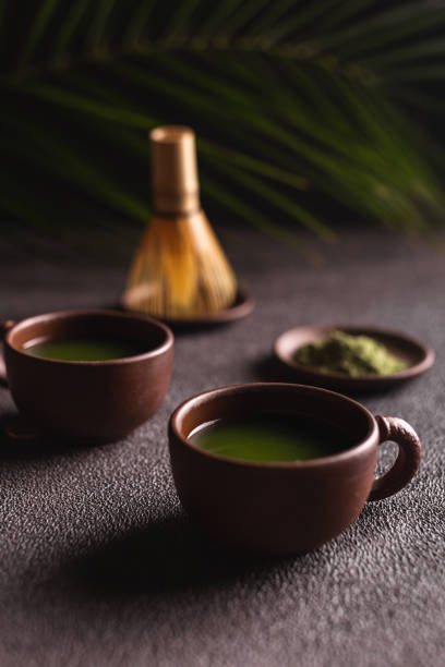 istock Matcha green tea in a ceramic mugs 1315354267