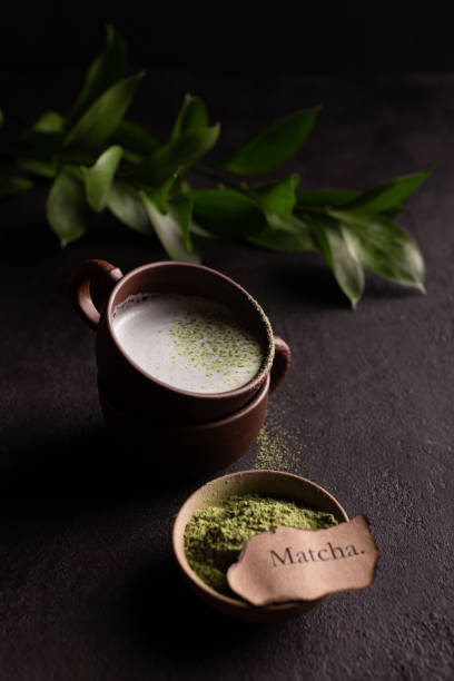 istock Cups of green matcha tea with milk 1315354295