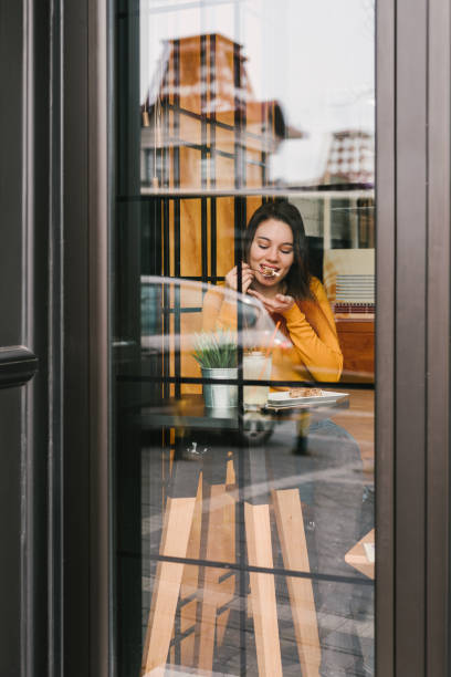 istock Woman eating cake 1315356118