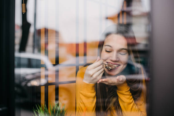 Woman eating cake