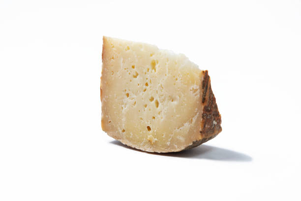 istock a piece of aged pecorino cheese in white background 1315356892