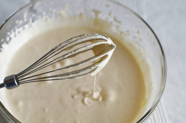 istock Whisk with whipped cream close-up 1315358243