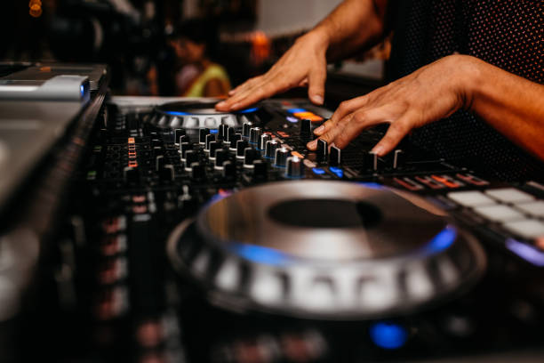 istock Two hands making music on a Dj desk 1315358264