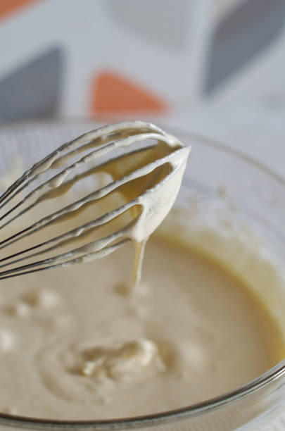 istock Whisk with whipped cream close-up 1315358294