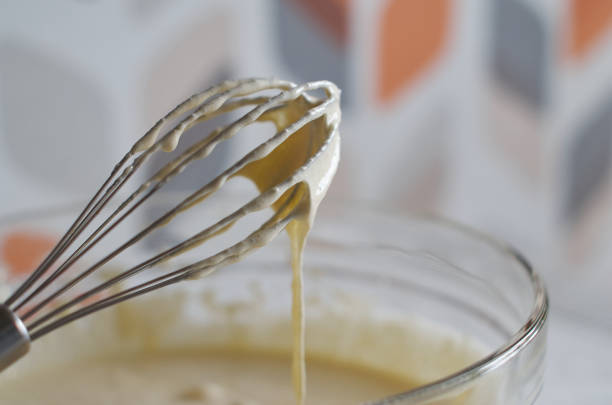 istock Whisk with whipped cream close-up 1315358304