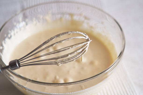 istock Whisk with whipped cream close-up 1315358478