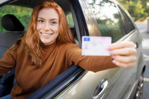 Photo of Portrait of young woman ready to drive her new car