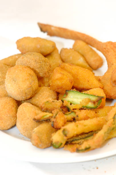 istock Mixed fried all'ascolana includes olives all'ascolana, artichokes, courgettes, lamb cutlets and fried cream. 1315362003