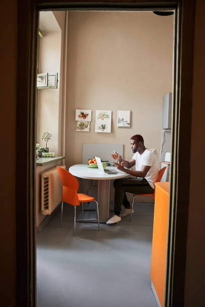 istock Man giving online educational class lecture or consulting customer from home 1315366380