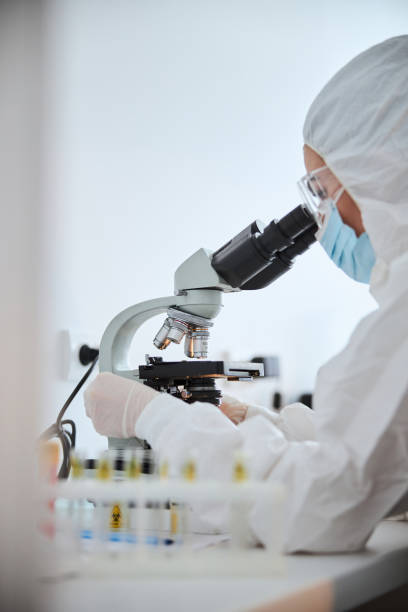 istock Woman scientist examining a coronavirus vaccine sample 1315369526