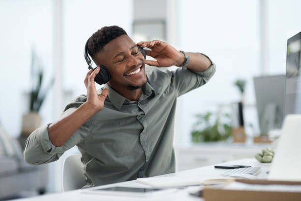 istock Shot of a young man on a call at work in a office 1315371186