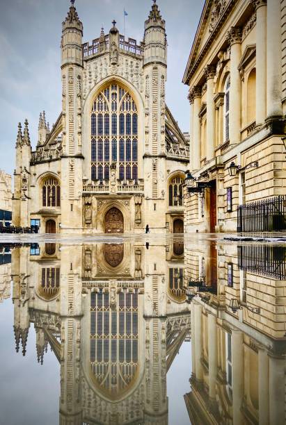 Reflection of Bath Abbey Reflection of Bath Abbey during lockdown with an empty city centre bath abbey stock pictures, royalty-free photos & images