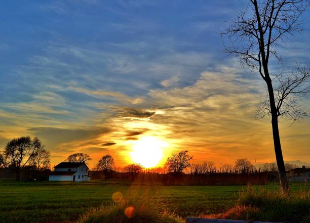 istock white country house at sunset with blue sky 1315375050