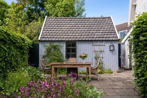 Old typical Dutch house with small garden