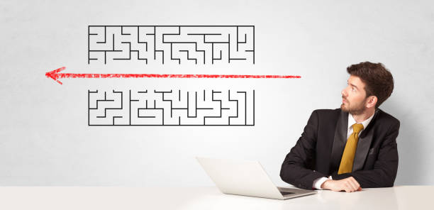 istock Businessman presenting maze 1315377052
