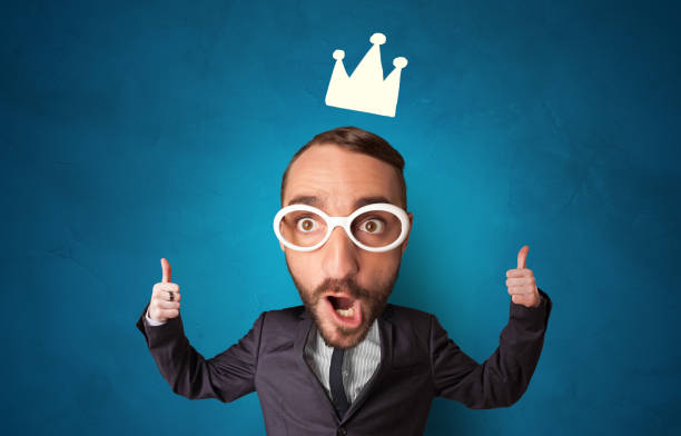 istock Big head on small body with crown 1315377280