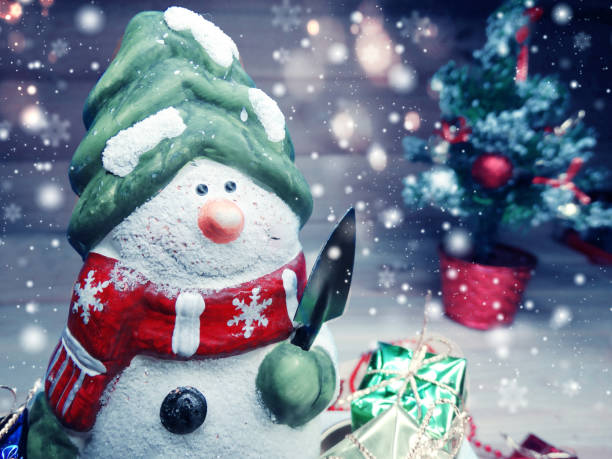 istock happy snowman christmas background with fir branches frame snow and copy space 1315379292
