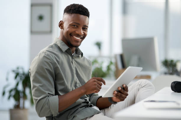 istock Shot of a young businessman working on a computer in an office 1315385404
