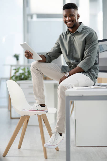 istock Shot of a young businessman working on a computer in an office 1315385426