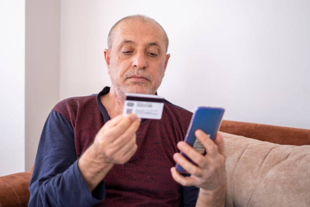 istock retired man shopping online 1315386659