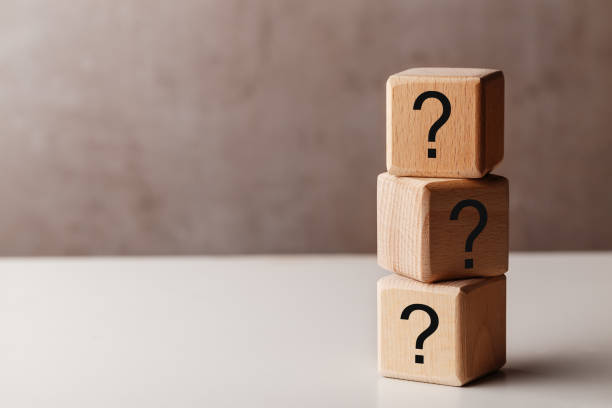 istock Wooden cubes with question mark, FAQ concept 1315391098