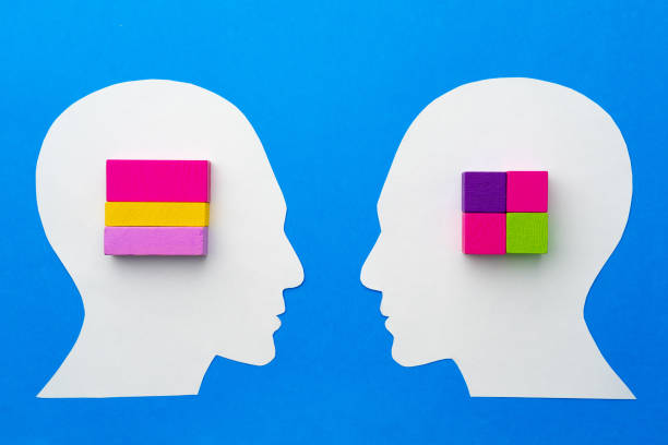 istock Papercut silhouette of human head with colorful constructor pieces 1315394788