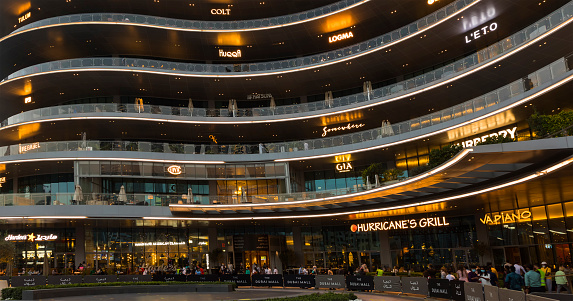 Dubai, UAE - March 04, 2021: Shops and cafes in Dubai Mall