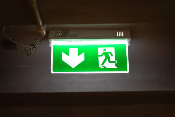 istock Doorway escape direction signboard. 1315402254