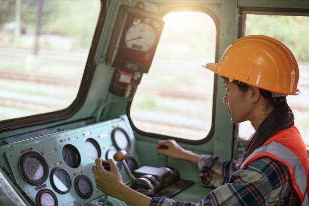The industrial mechanical engineer technician is driving the operation of the machine.