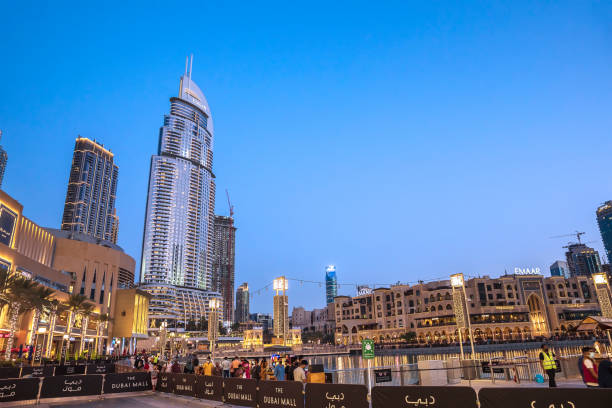 Dubai, UAE - March 04, 2021: Square and pool in front of Dubai Mall