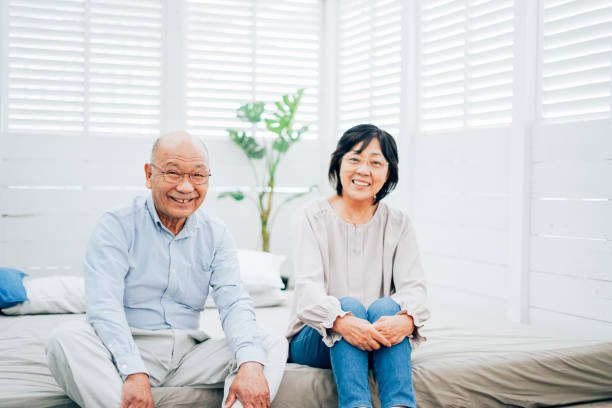 istock Elderly couple relaxing in their bedroom 1315404687