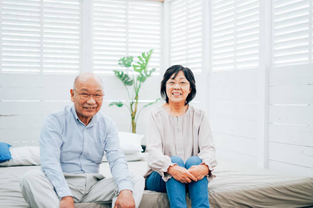 istock Elderly couple relaxing in their bedroom 1315404691