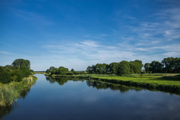 istock Wide clear water river landscape. 1315405469