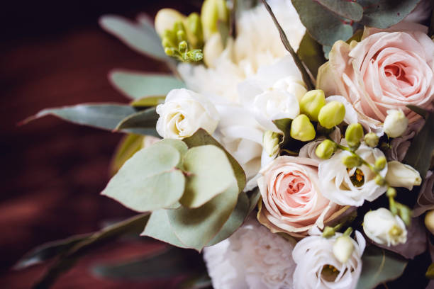 istock Rustic wedding flower bouquet made with roses. Empty copy space floral background. 1315406169